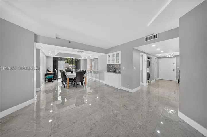 SPACE FROM DINING TO LIVING AND FOYER