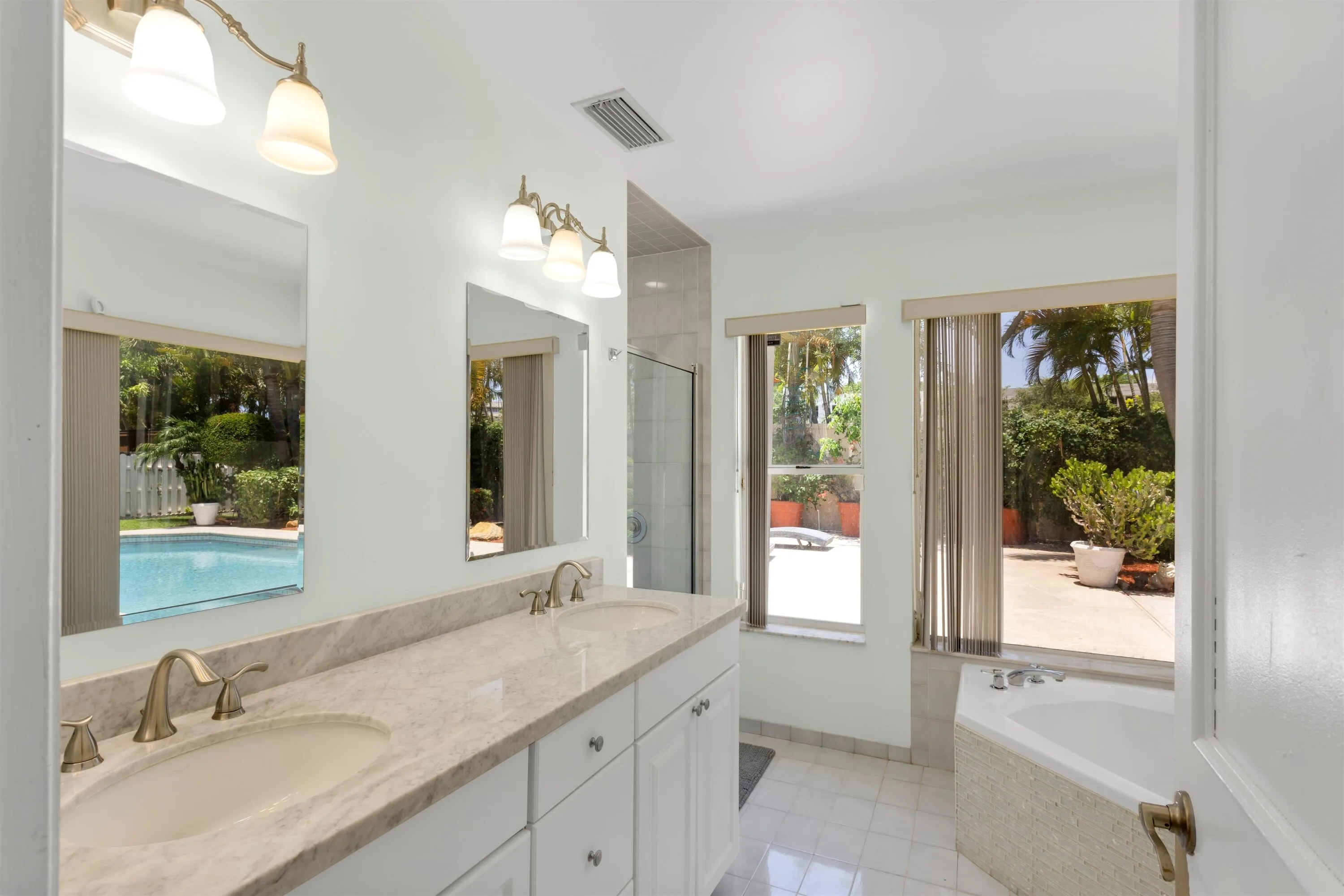 dual vanities, separate shower and soaking tub