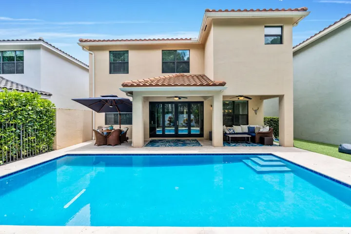 The "Verona" model BUT with a private pool with turf backyard