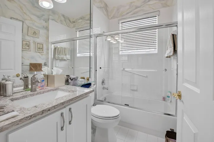 this bathroom is between the two guest bedrooms