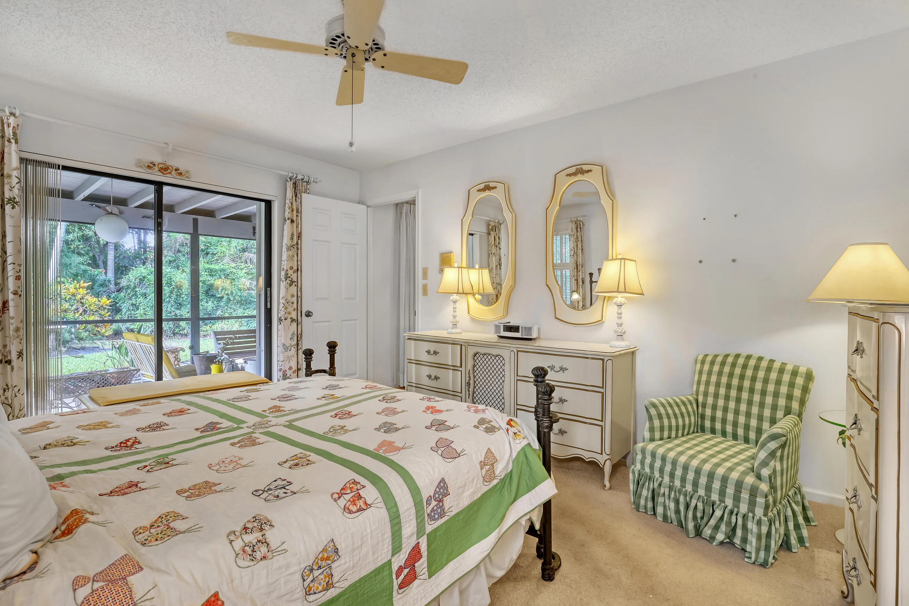 The primary suite opens directly onto the lanai.
