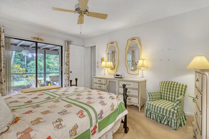 The primary suite opens directly onto the lanai.