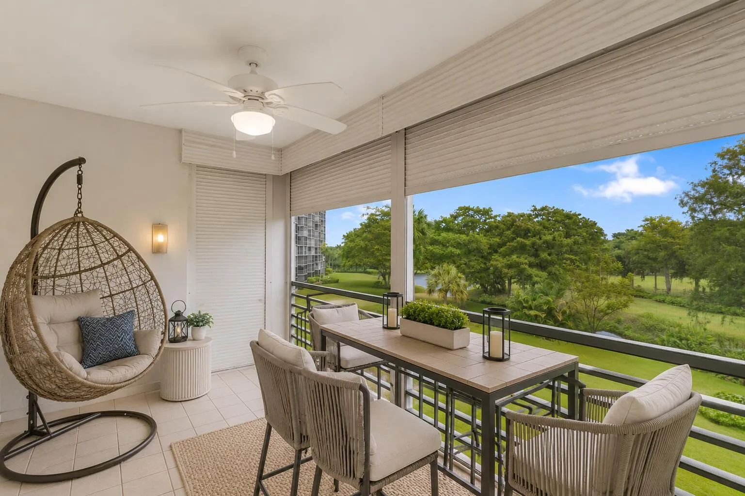 Virtually staged. This inviting retreat is perfect for morning coffee, outdoor dining, or unwinding at the end of the day while taking in the peaceful scenery.