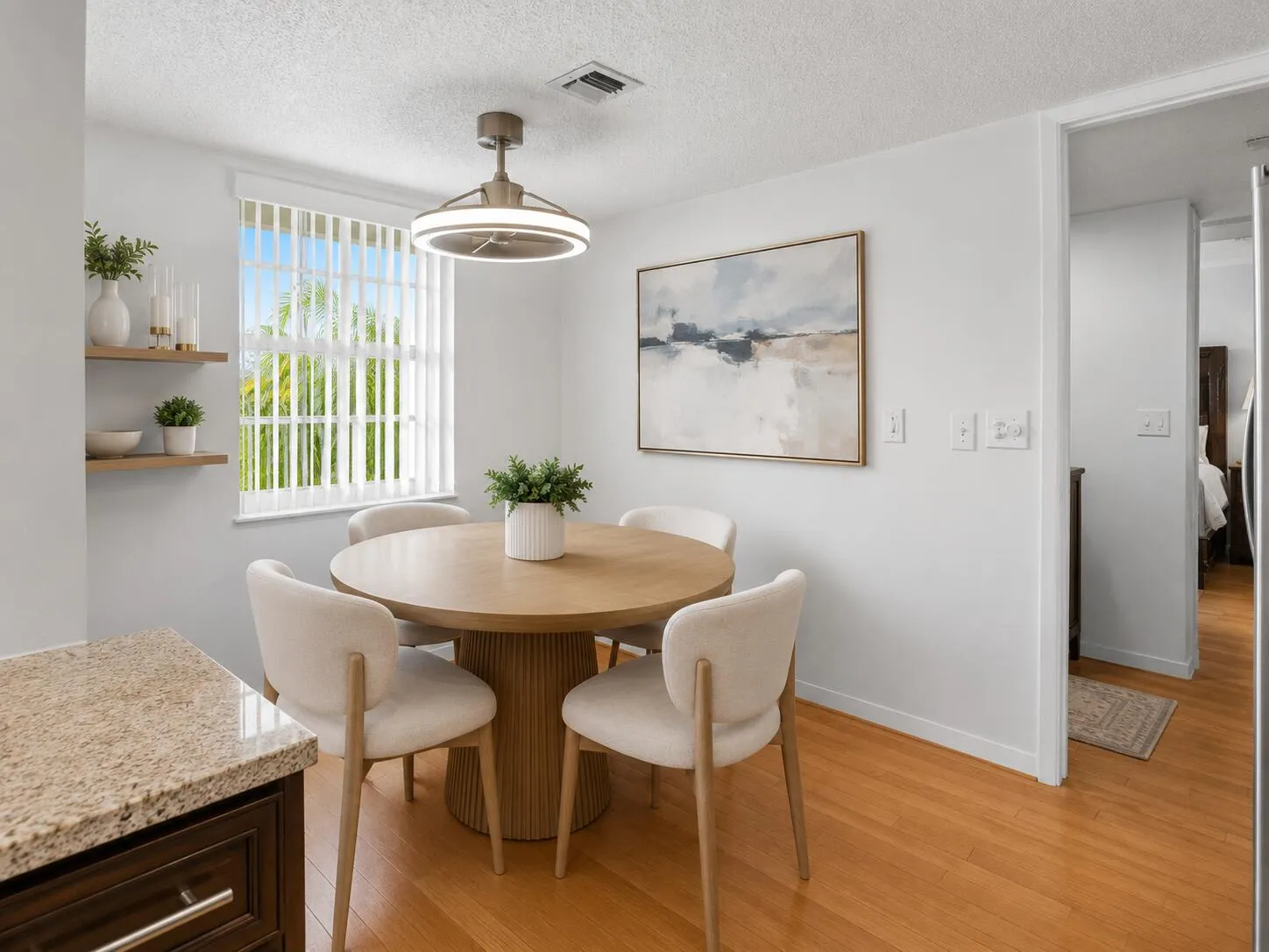 Virtually staged breakfast nook.