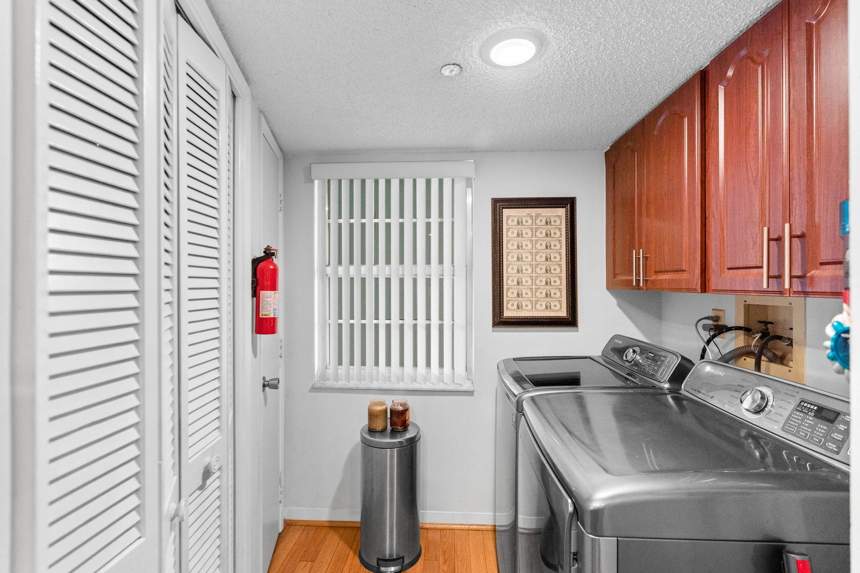 The pantry and full-size laundry provide exceptional storage and convenience.