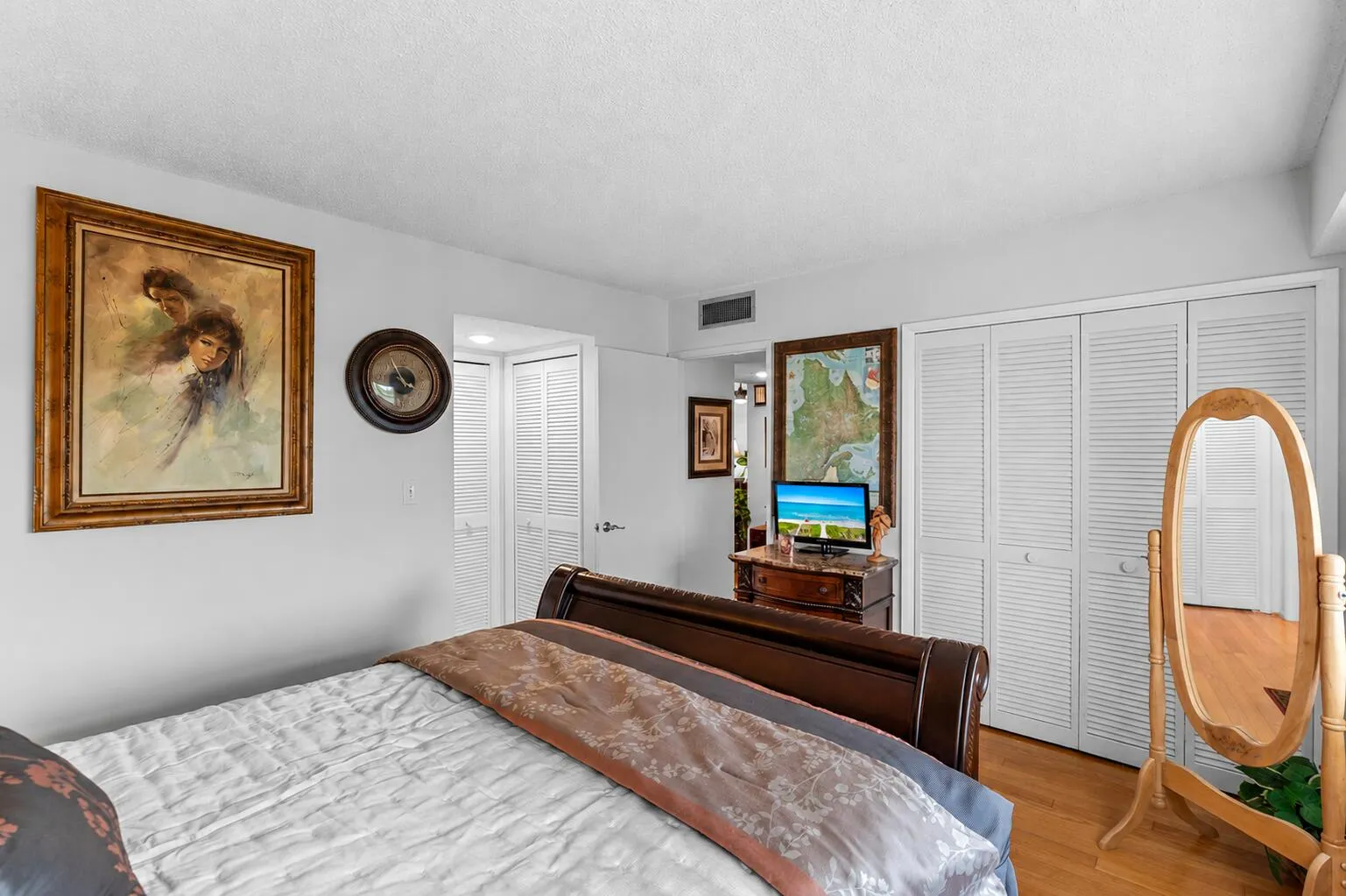 Featuring two closets plus a separate linen closet, this is an inviting suite.