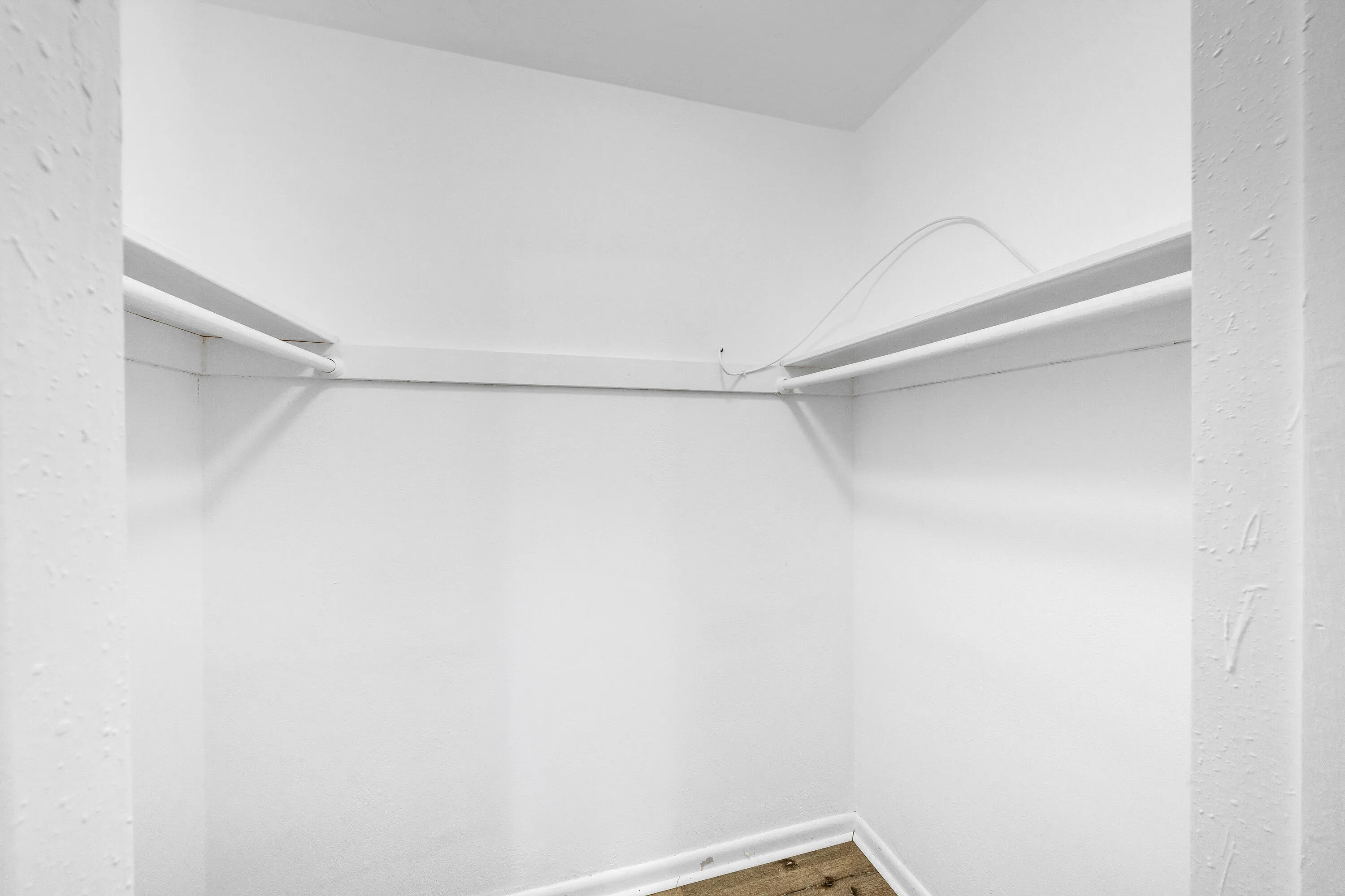 Walk-In Closet in Primary Bedroom