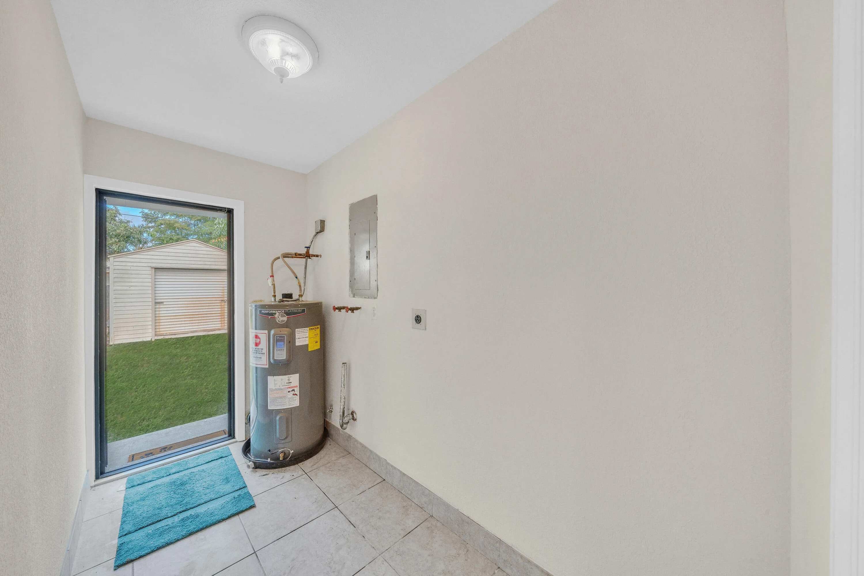 Frosted Impact Glass Door From Laundry Room to Back Garden