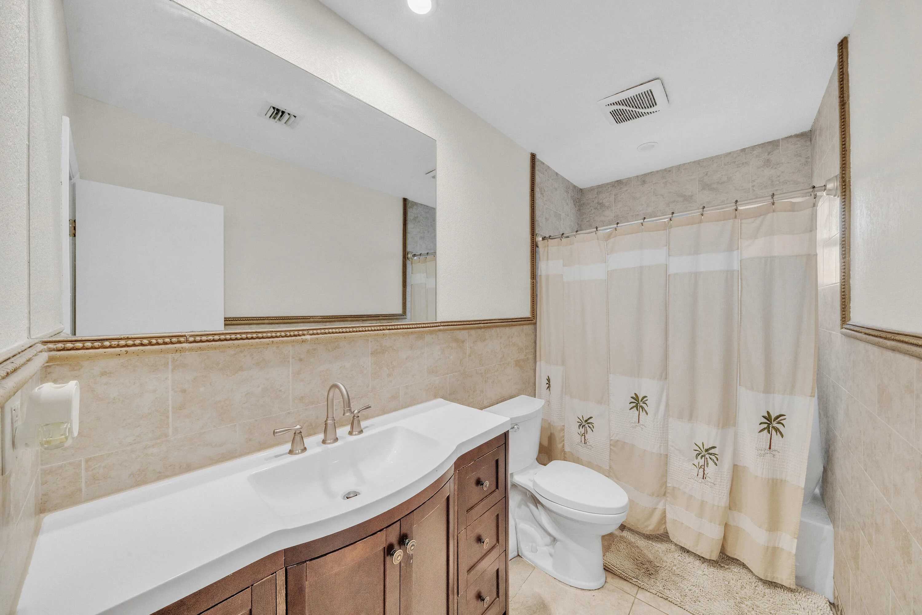 Large Bathroom with tub and shower combination