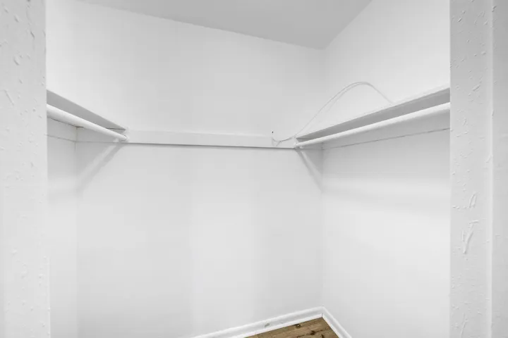 Walk-In Closet in Primary Bedroom