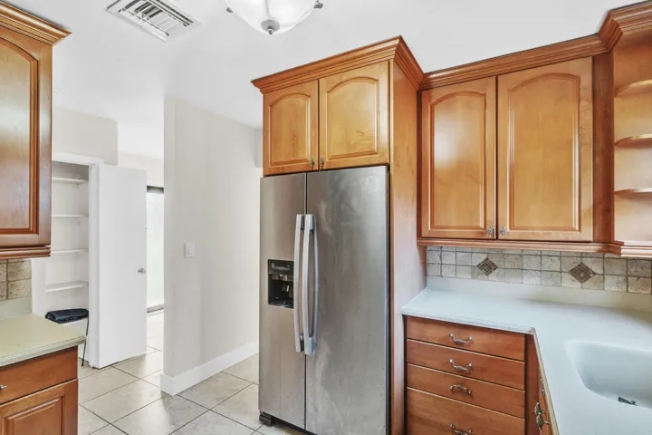 Stainless Steel Appliances & Tiled Back Splash