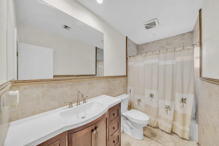 Large Bathroom with tub and shower combination