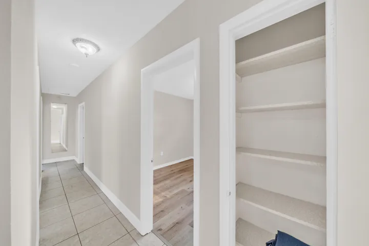 Pantry/ Linen Closet Across Kitchen Hallway