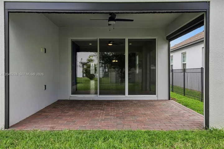 Patio with motorized retractable screens