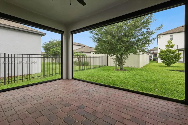 Patio with motorized retractable screens