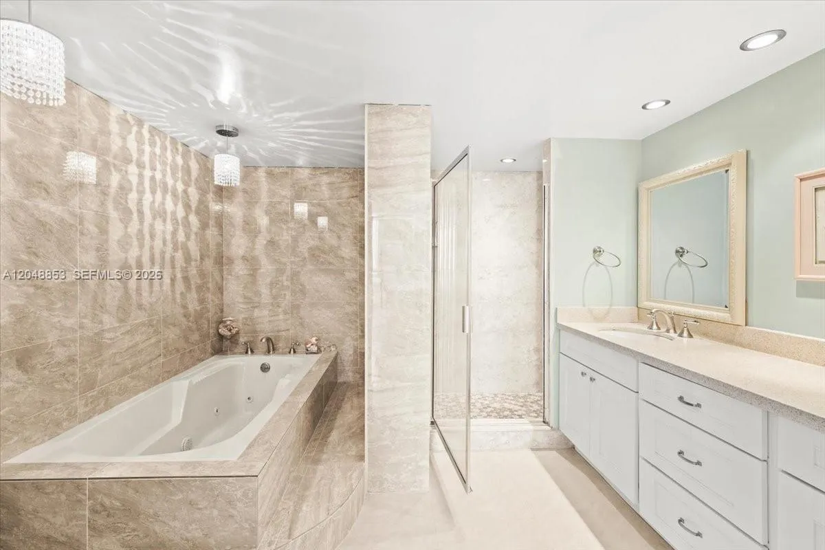 great bathroom with tub and separate shower