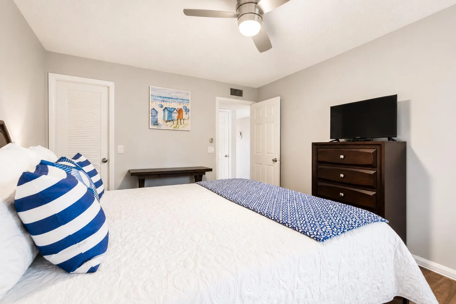 Primary Bedroom with Television and Stor