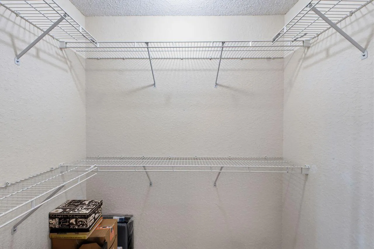 walk-in closet 3rd bedroom