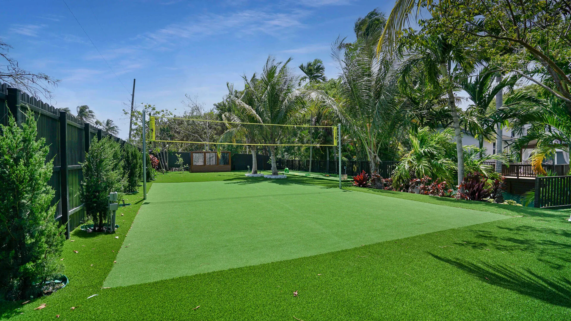 Expansive turf court with volleyball net