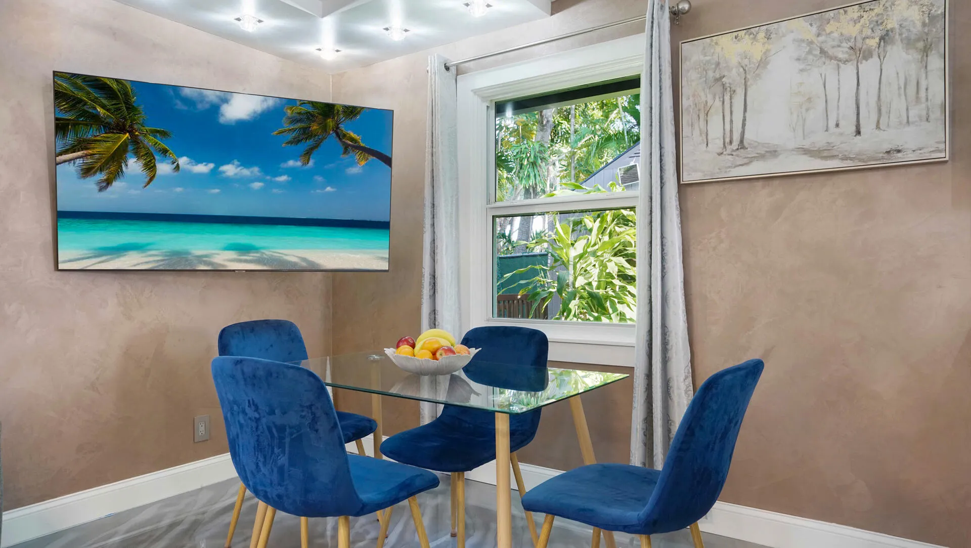 Dining area featuring an accent wall, recessed lighting, and a double-hung window