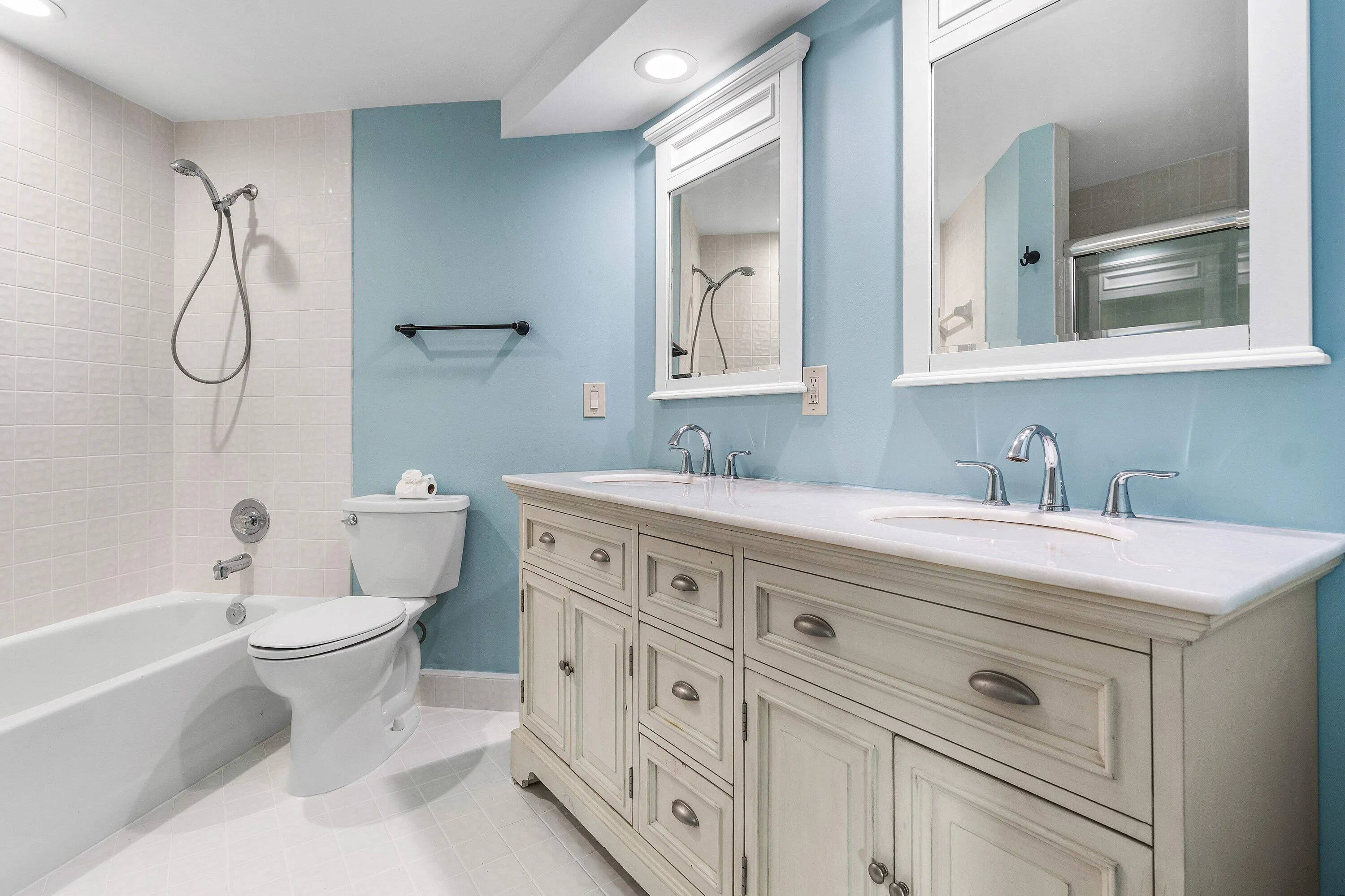 Dual vanity with undermount sinks and brushed nickel fixtures