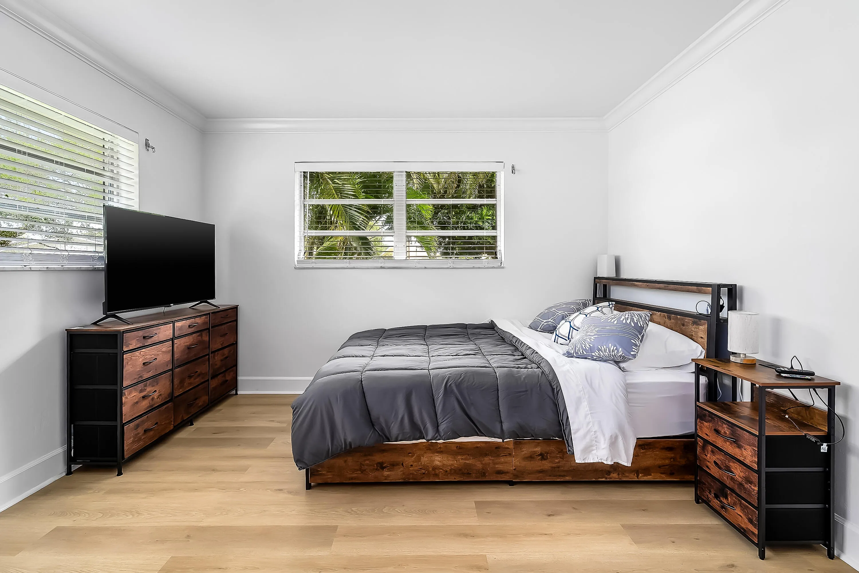 Bright interior room featuring wood-finish flooring