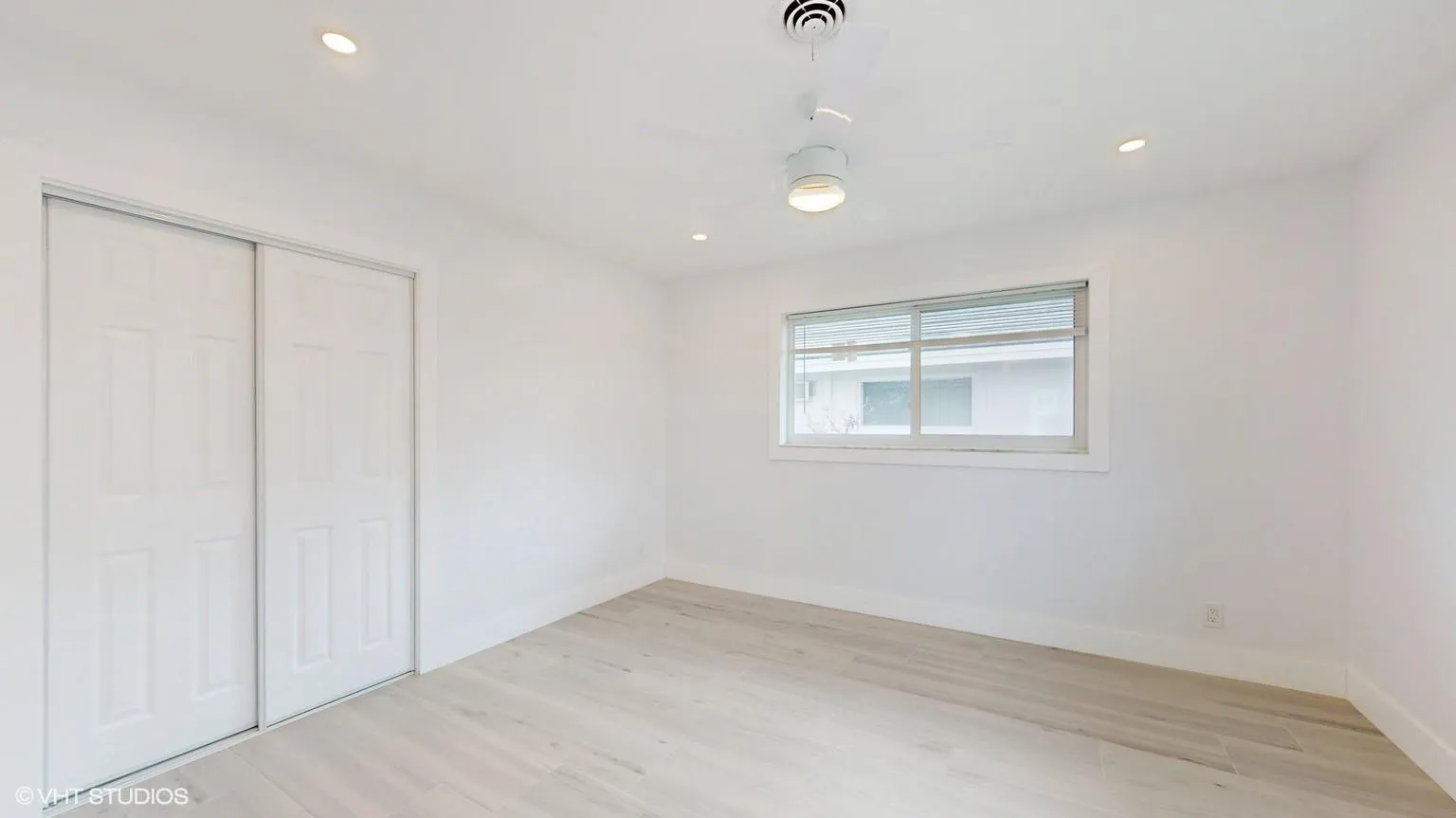 Bedroom has 2 sets of windows for a very bright and airy feel. One of the windows faces the sideyard