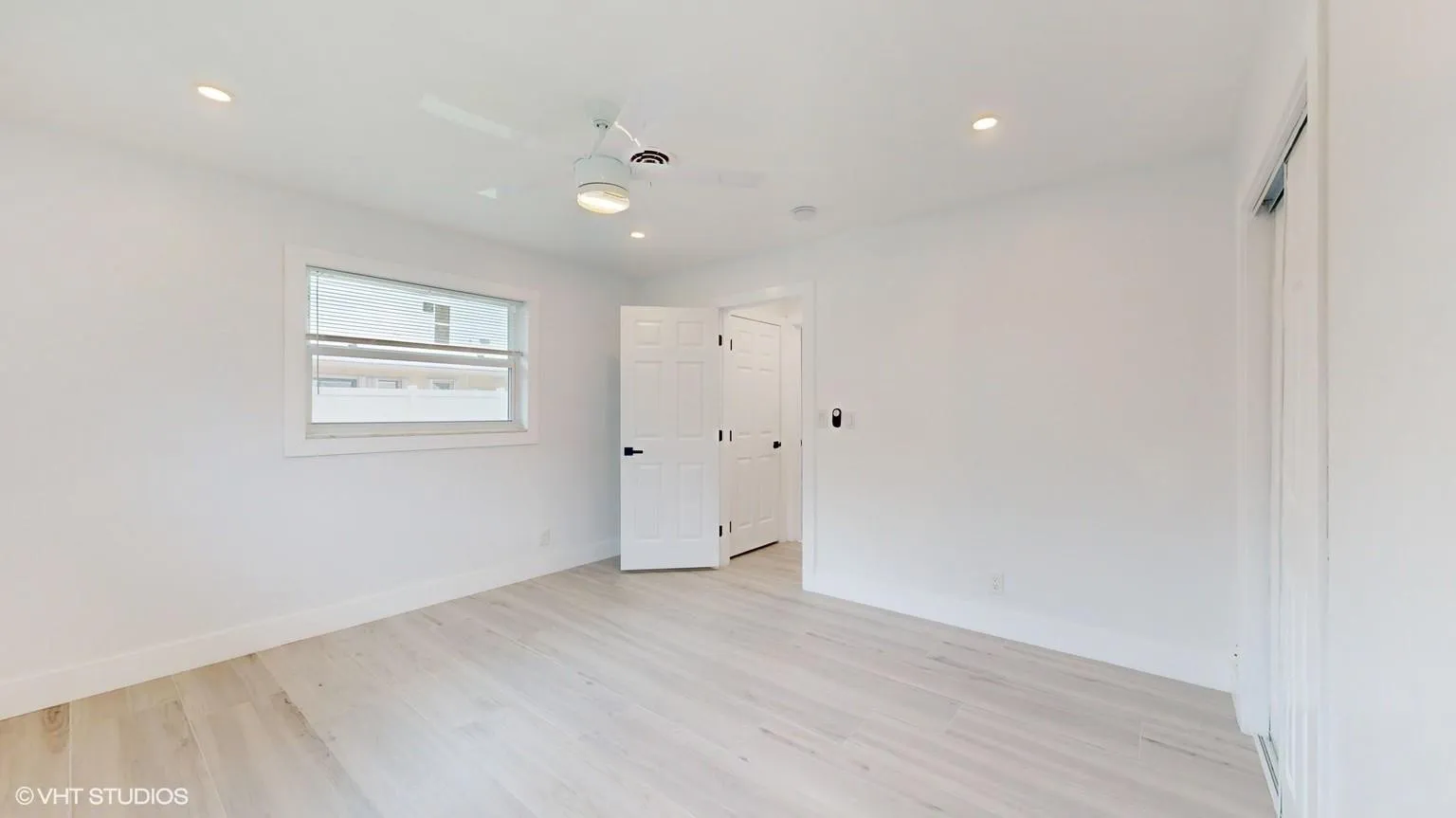 Bedroom has 2 sets of windows for a very bright and airy feel. One of the windows faces the backyard