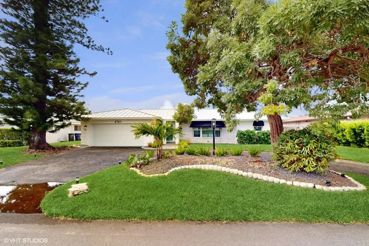 Front of Home picture shows circular driveway with enough parking for at least 7 cars