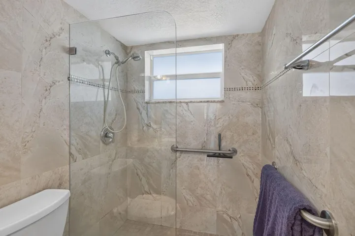 SHOWER IN THE BATHROOM
