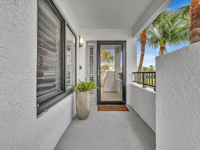 Front Entry with water and fountain views