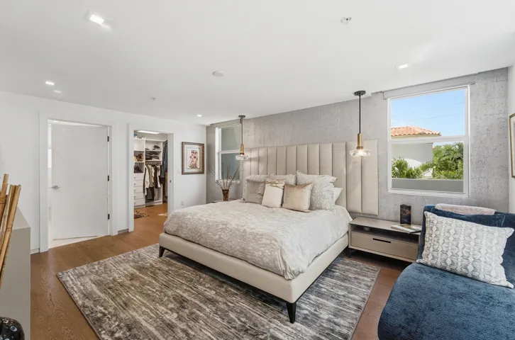 Primary Suite, Generous Walk In Closet with Custom Built Organization