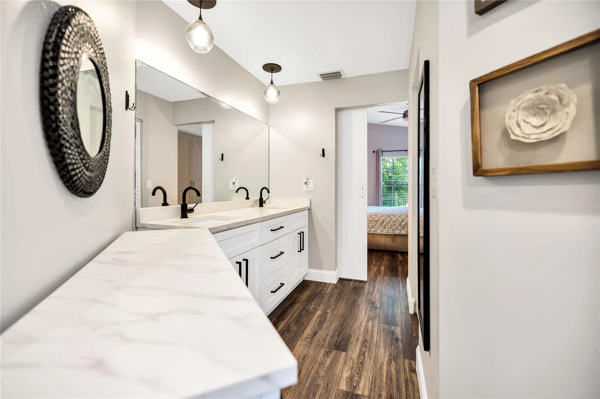 View of bathroom, facing bedroom. Clean, modern, spacious.