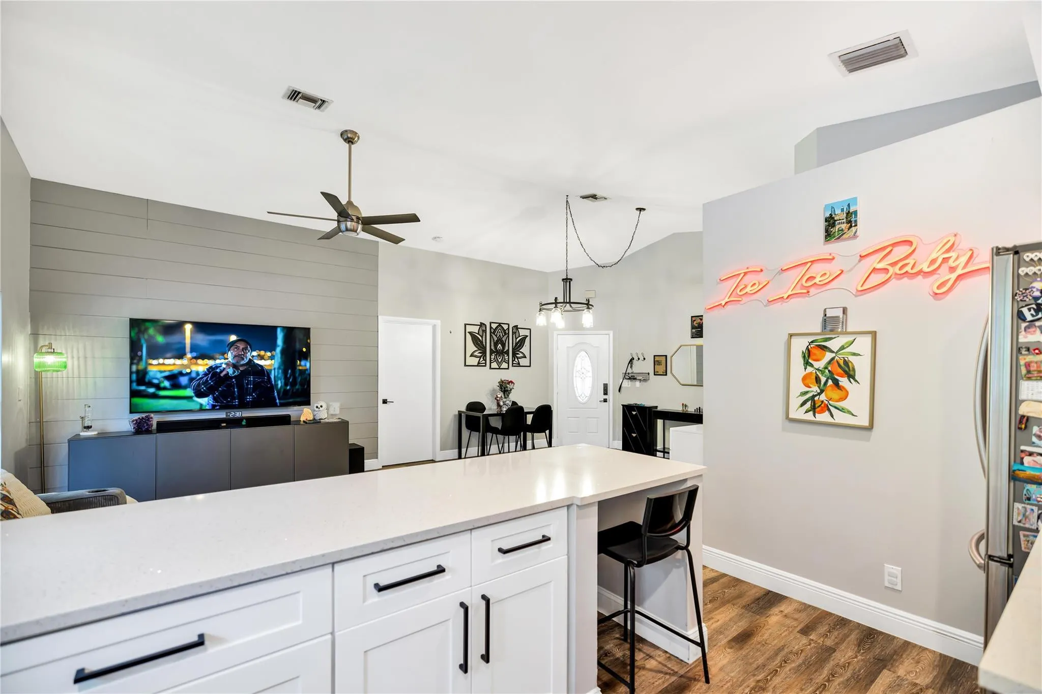 View from Kitchen Area, features eat-at counters and a Workstation/ Wine-fridge ready nook.