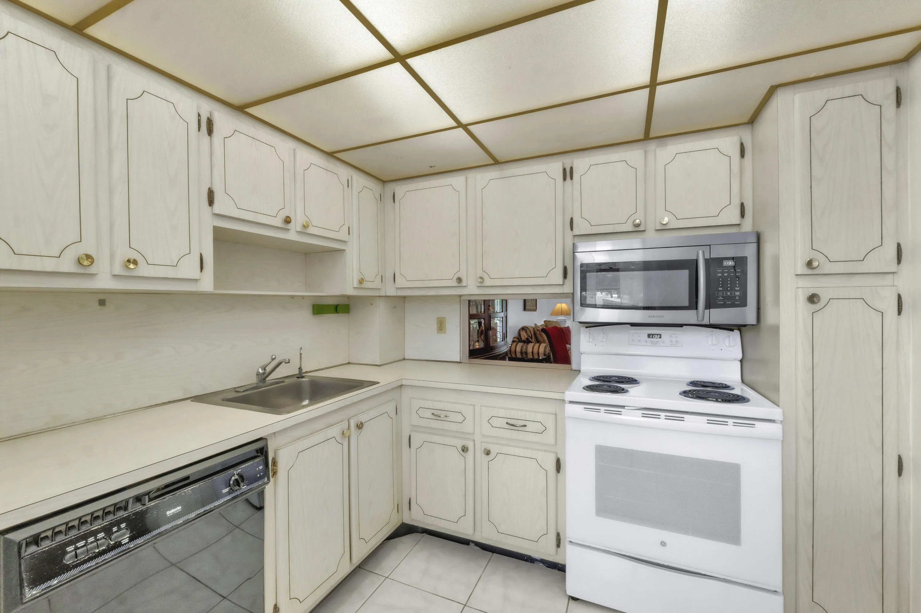 Kitchen featuring a stainless steel over-the-range microwave.