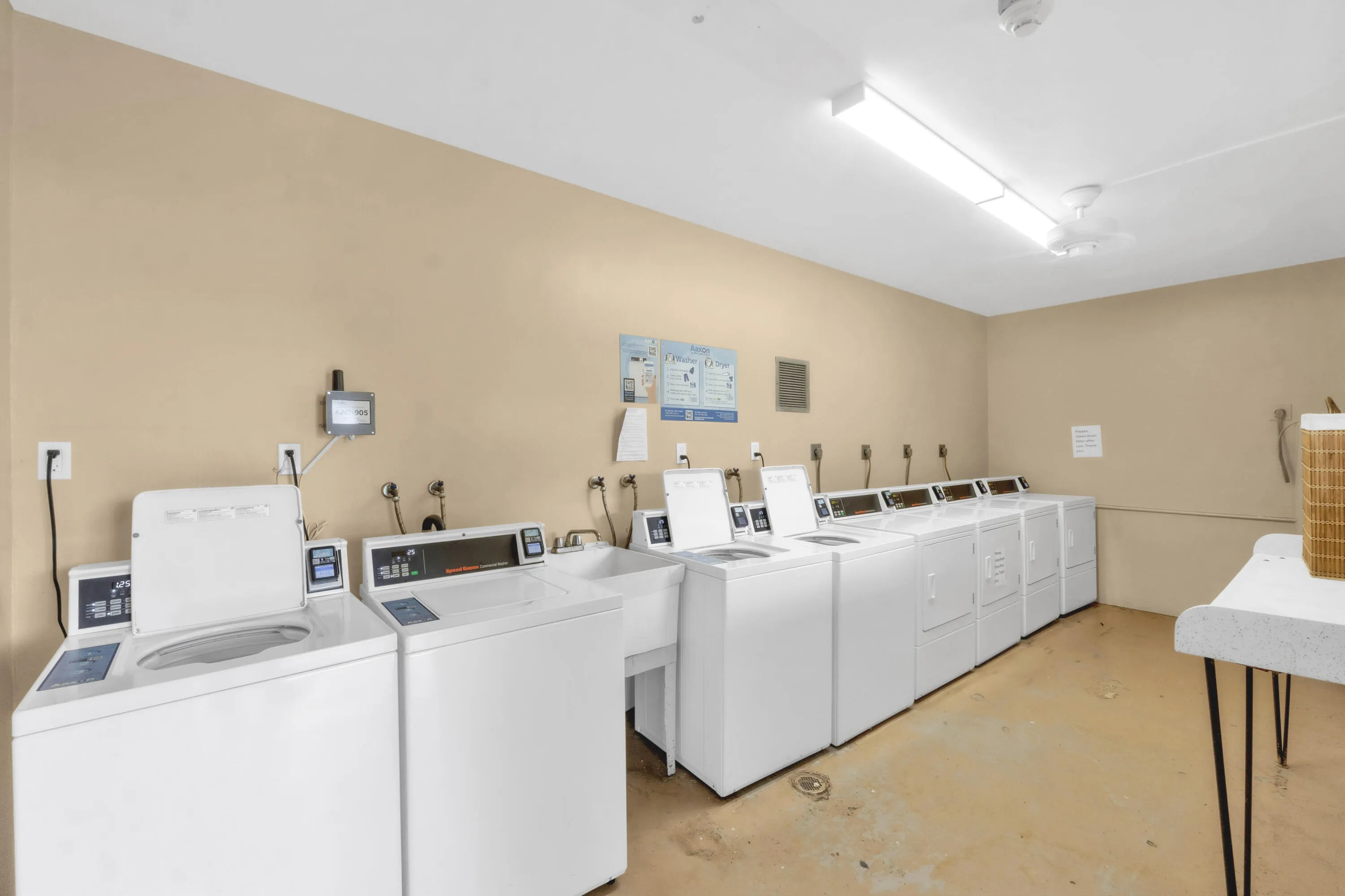 On-site laundry facility is just a few doors from the property and features card-operated and app-operated and app-operated appliances and a utility sink