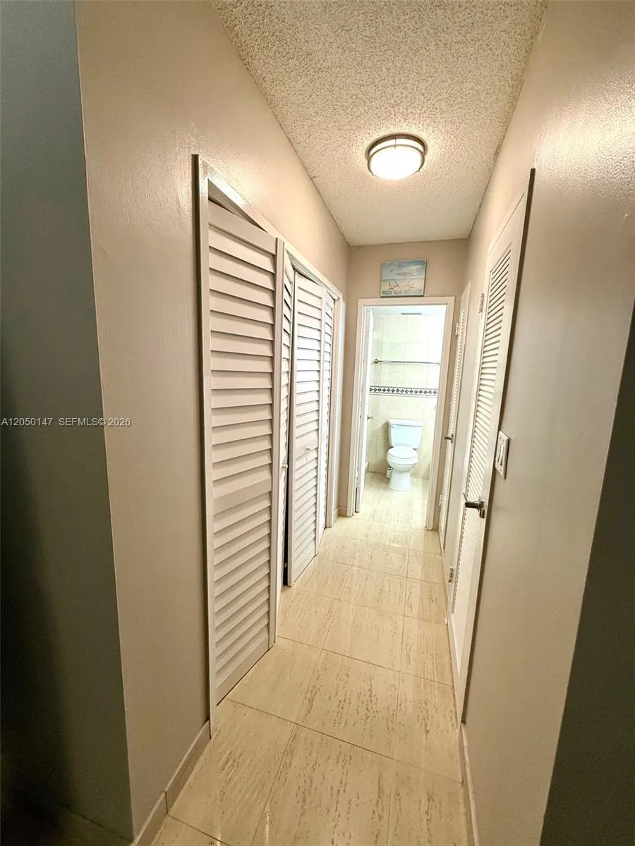 Master hallway to bathroom and closets