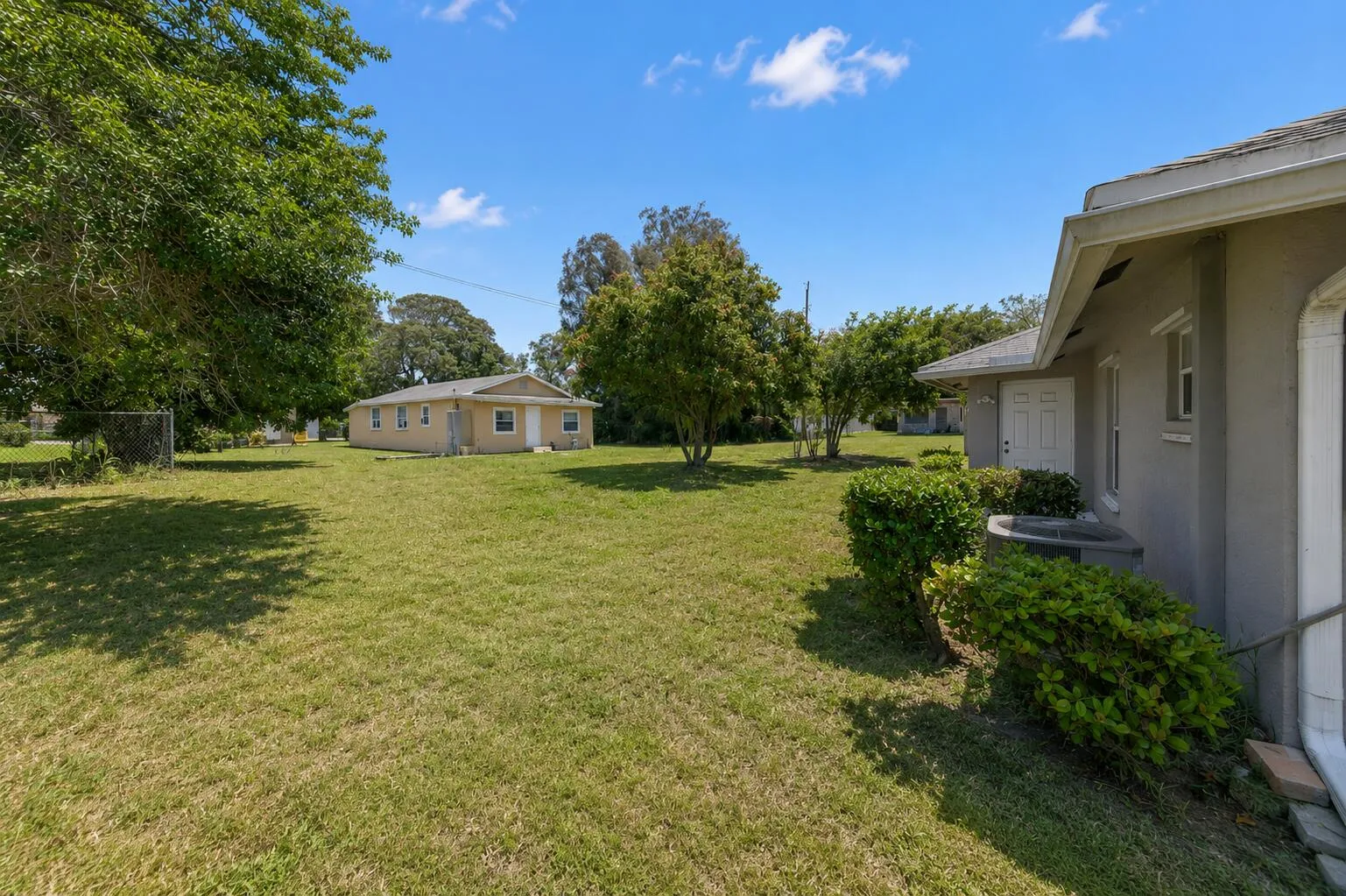 Expansive backyard offering room to entertain, garden, or create your ideal outdoor oasis
