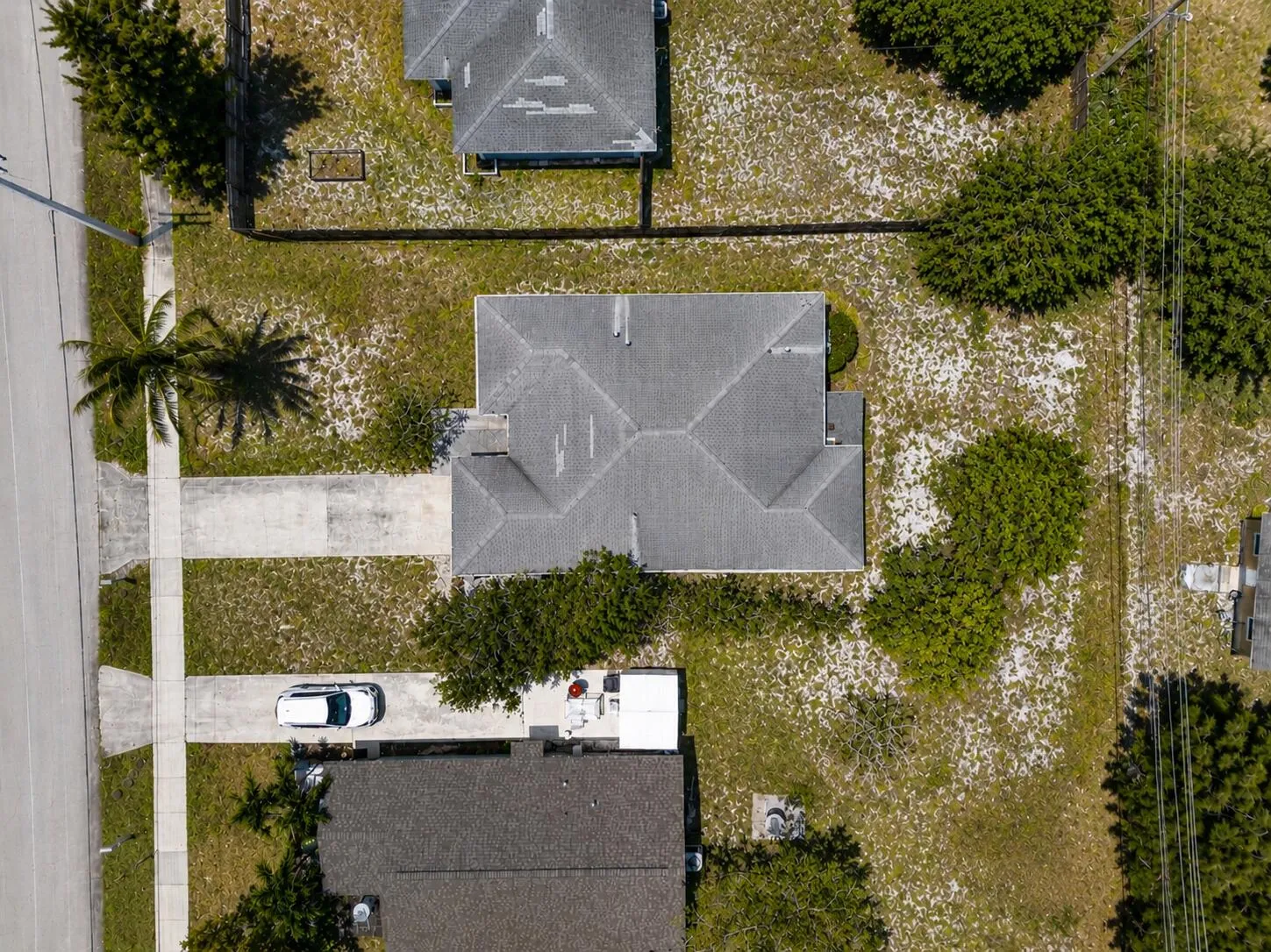 Top-down aerial perspective showing the property layout and backyard space potential