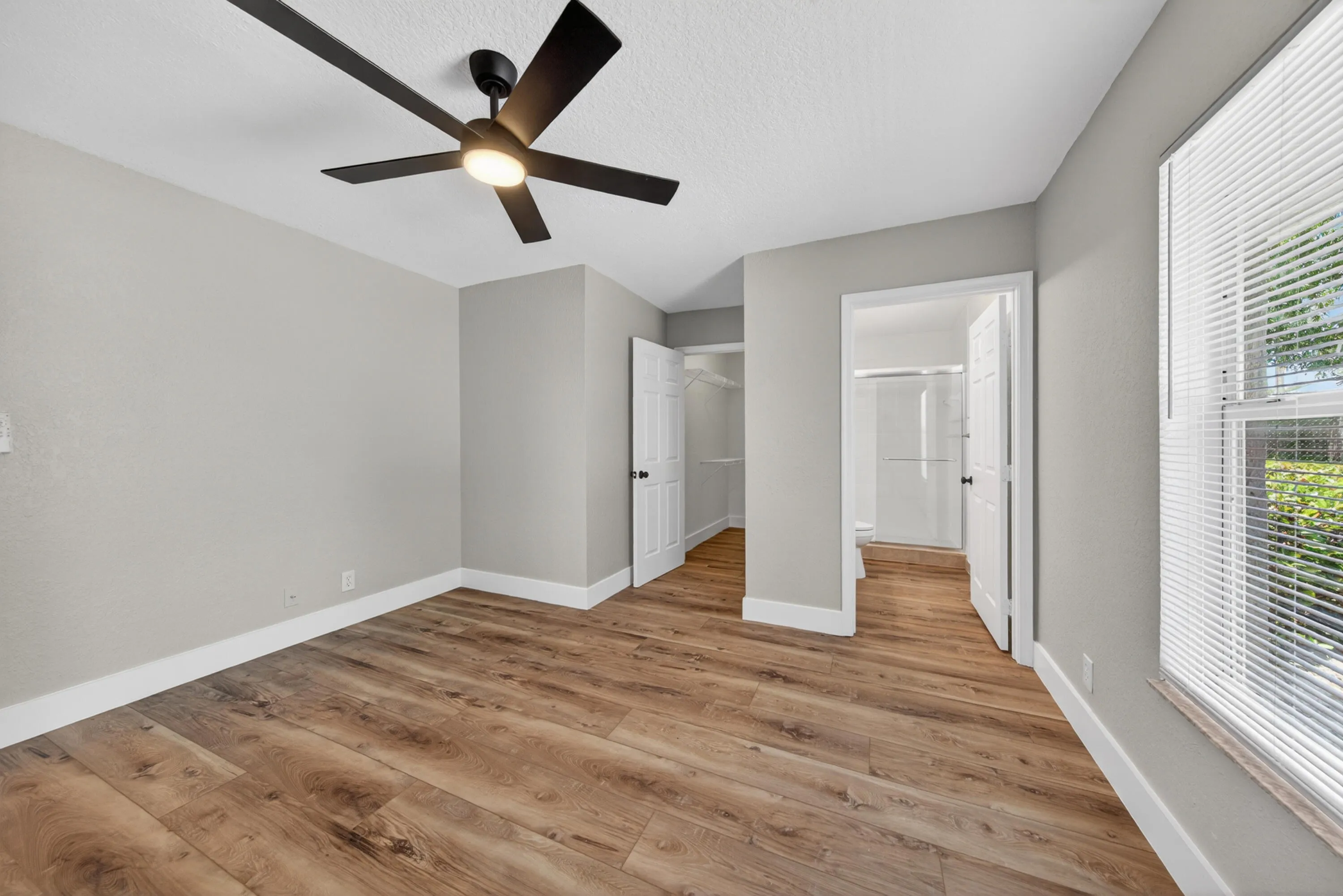 Additional view of the primary bedroom and ensuite access