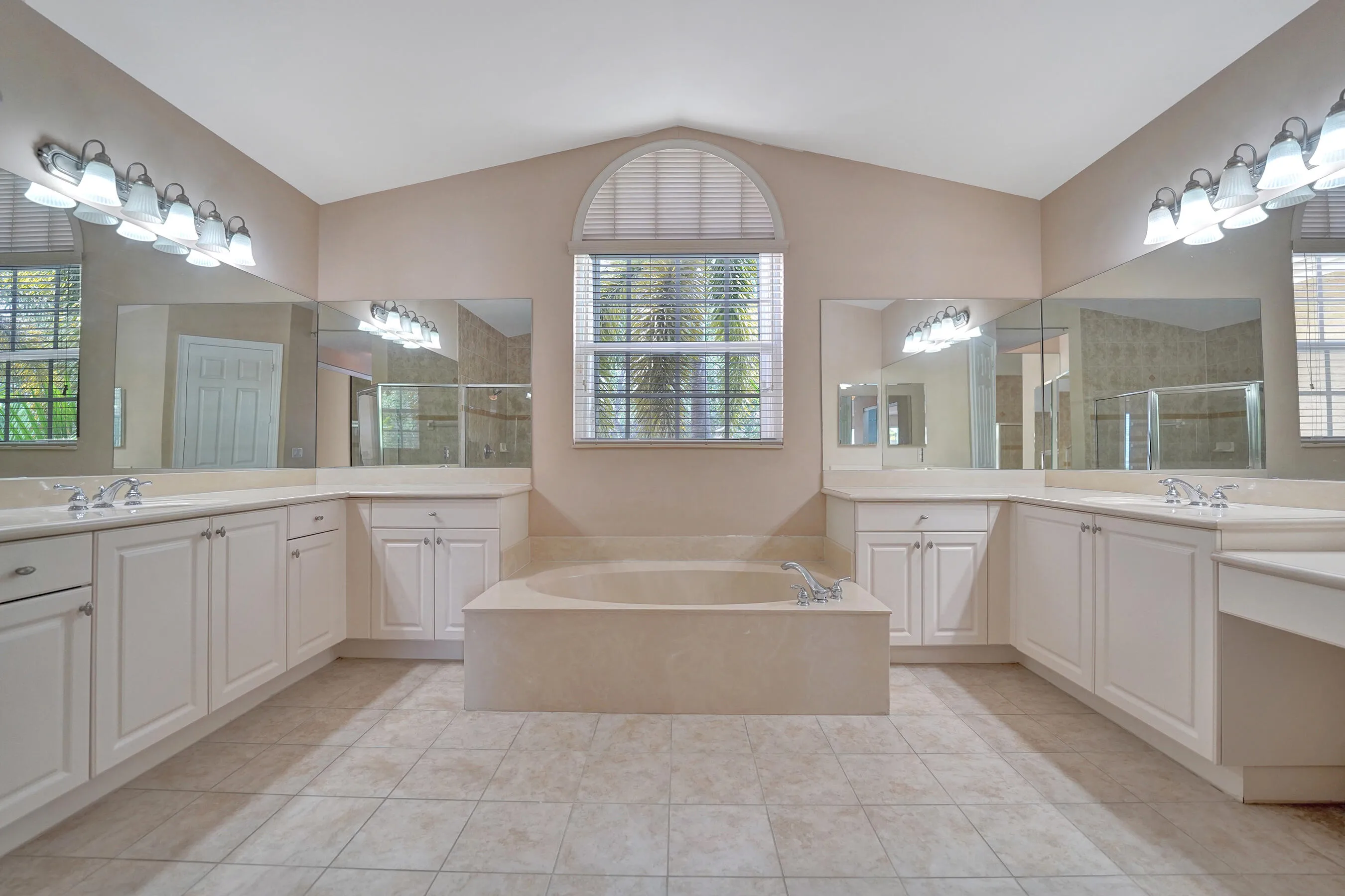 Spacious primary bathroom with soaking​​‌​​​​‌​​‌‌​‌‌​​​‌‌​‌​‌​‌​​​‌​​ tub