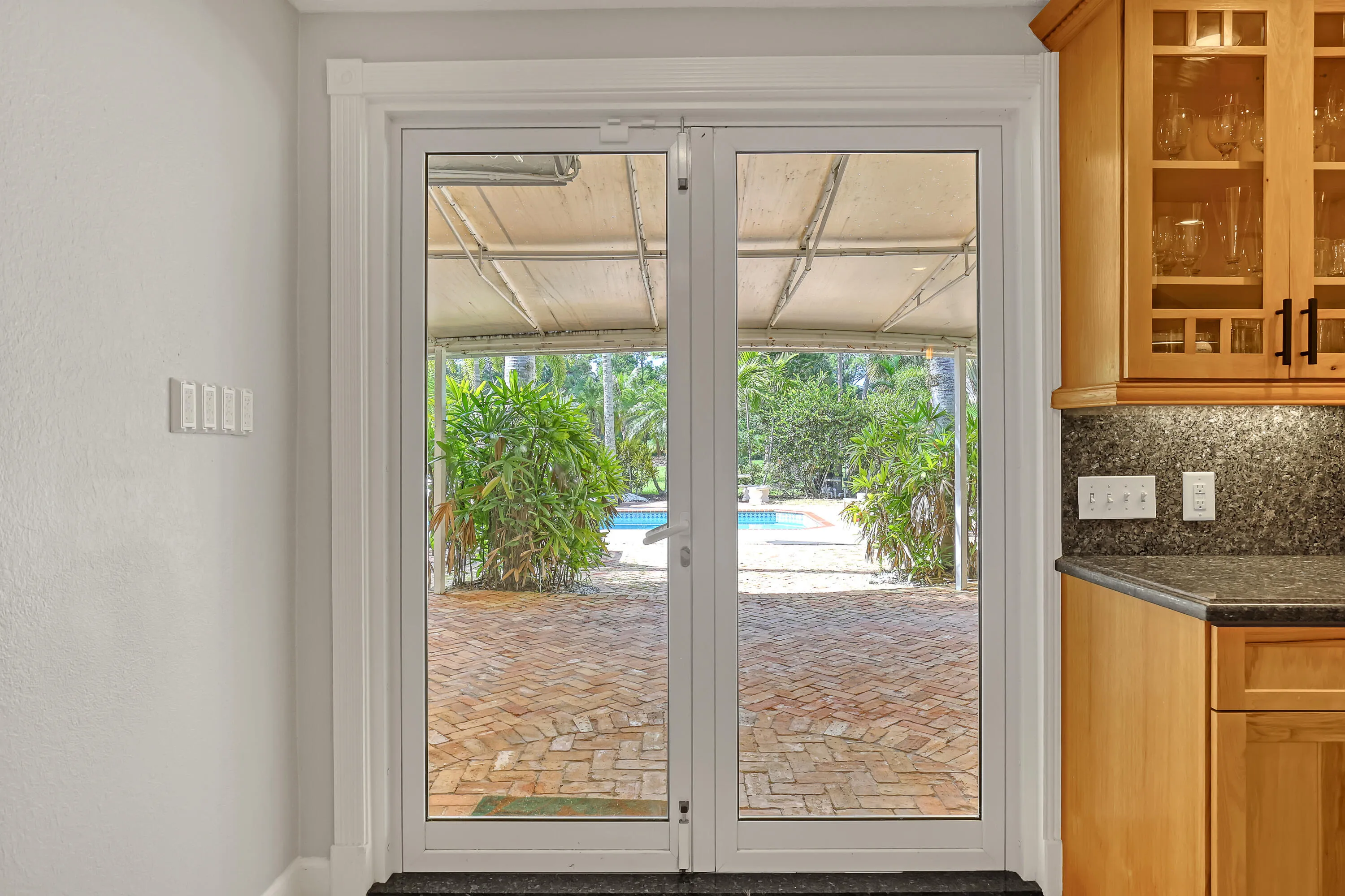 French Door to Cov'd Patio & Pool
