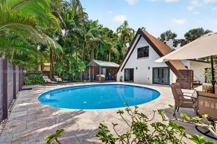 Travertine Deck surrounding beautiful large pool