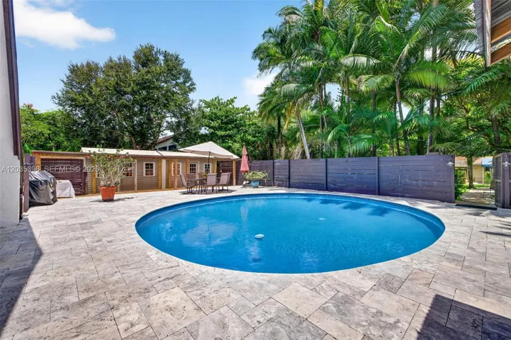 Travertine Deck surrounding beautiful large pool