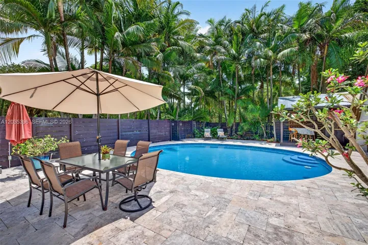 Travertine Deck surrounding beautiful large pool