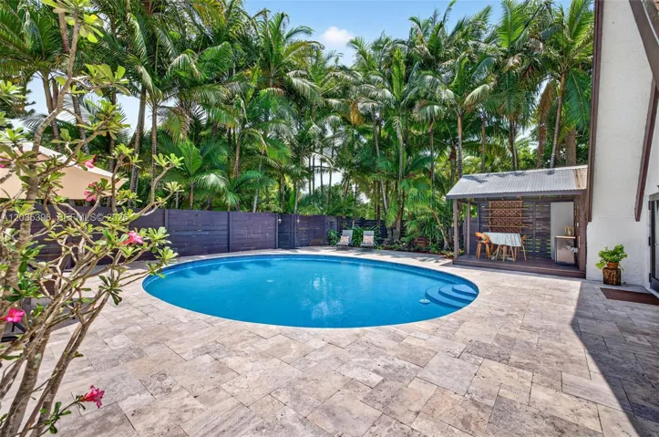 Travertine Deck surrounding beautiful large pool