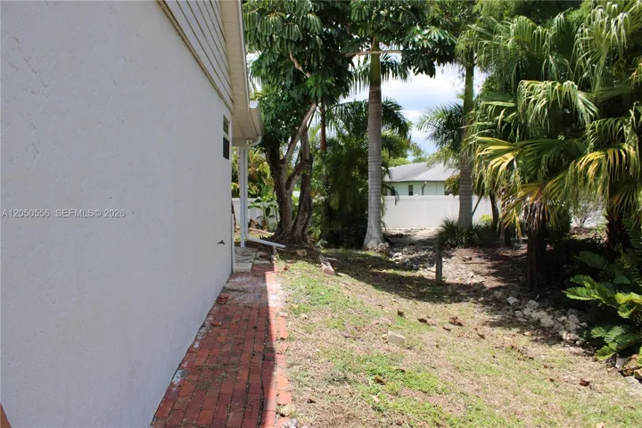 FRONT OF HOME RIGHT SIDE YARD
