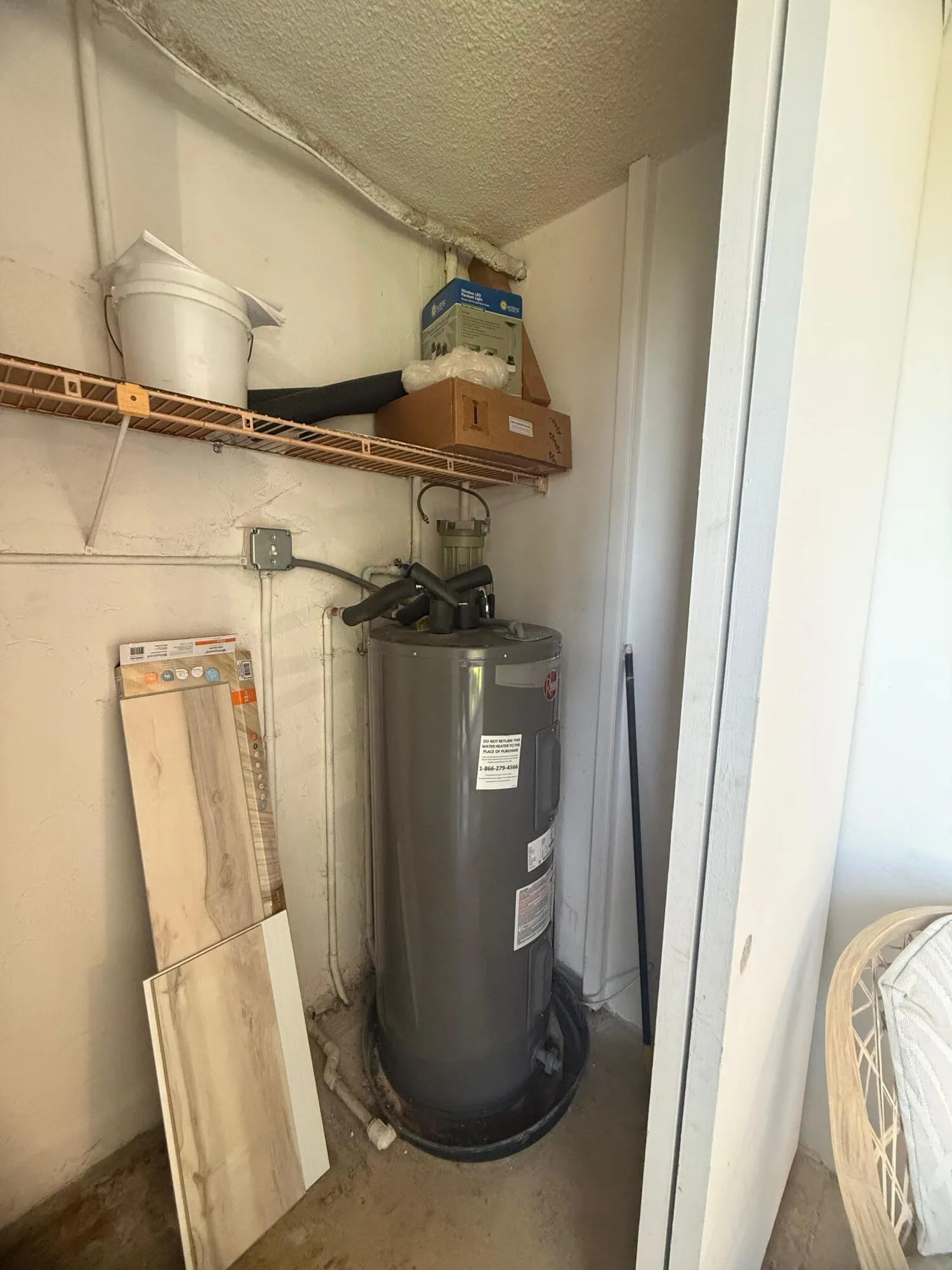 Water heater in storage closet