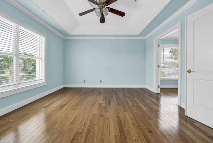 Primary bedroom with an adjacent sitting room or can be closed off to make it a 4th bedroom.