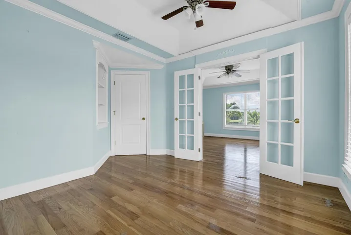 Easily converted to a 4th Additional bedroom with separate entrance off the primary bedroom.